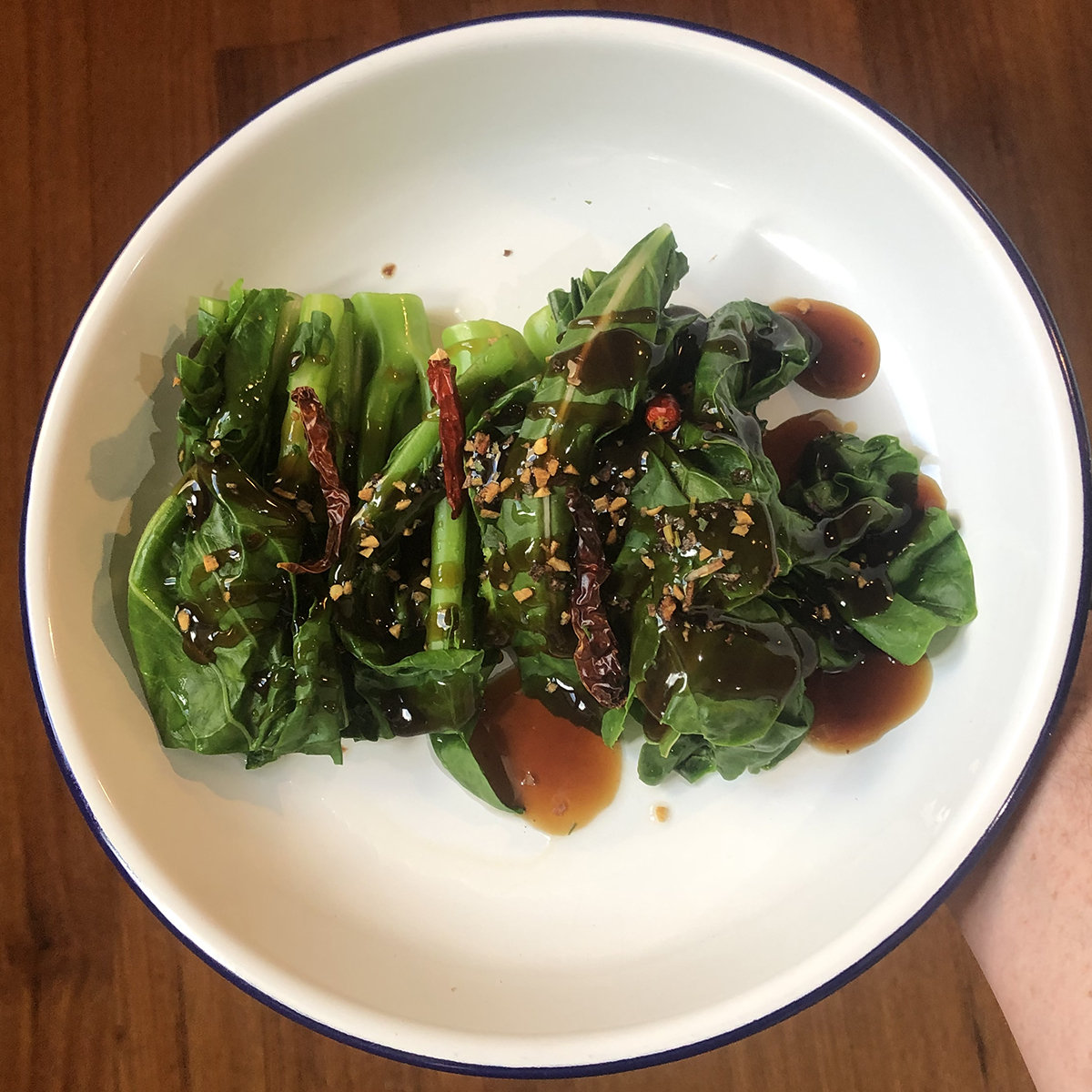 Greens served on a plate with oyster sauce